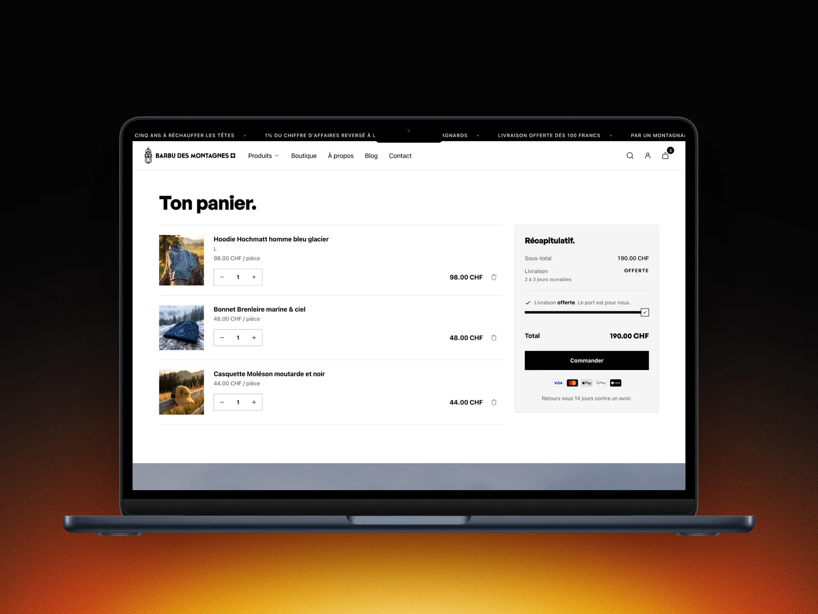 Page Ton panier de Barbu des Montagnes sur un MacBook : un hoodie, un bonnet et une casquette, livraison offerte