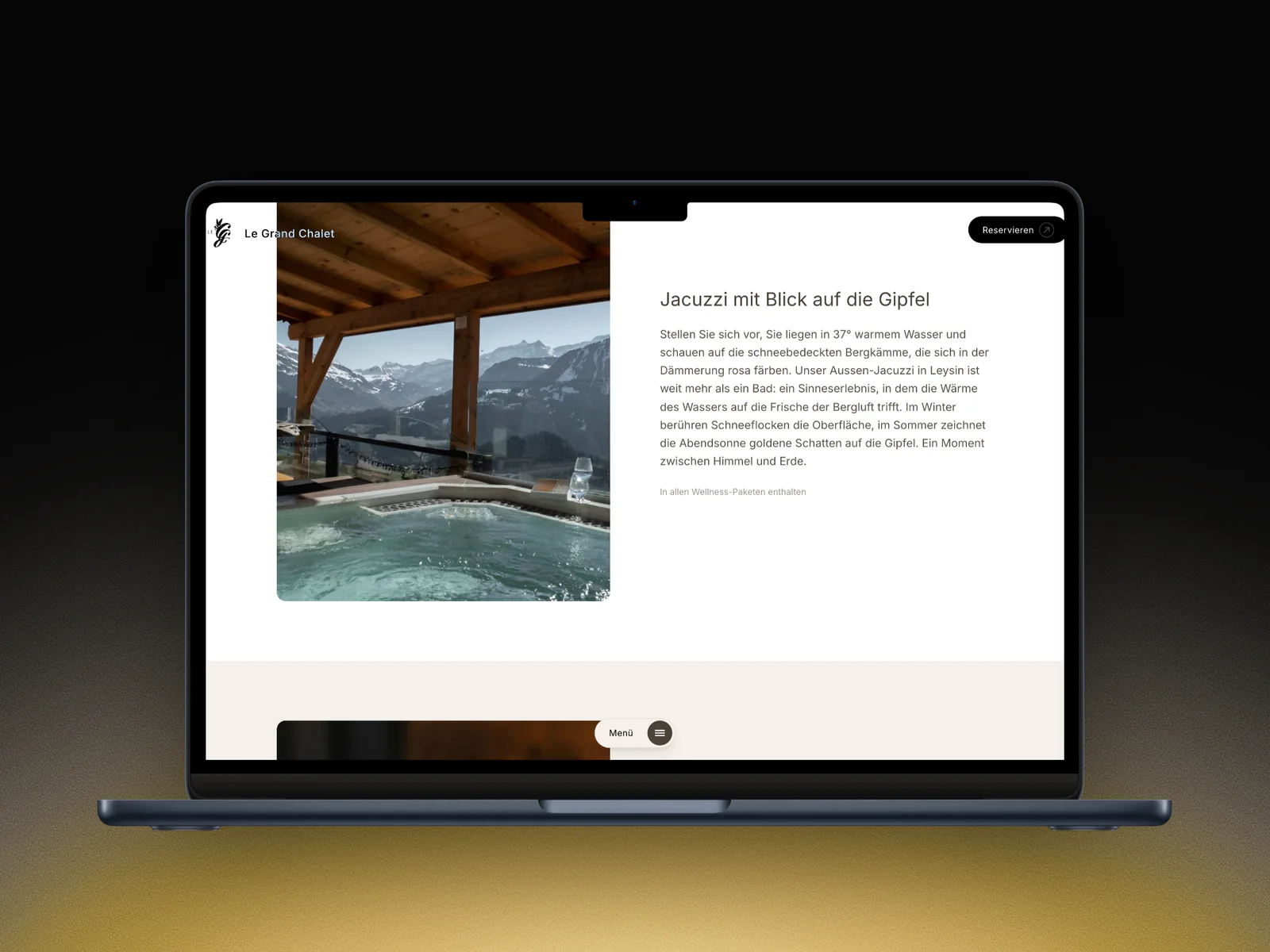 La page de l'espace bien-être du Grand Chalet en allemand sur un MacBook : Jacuzzi mit Blick auf die Gipfel