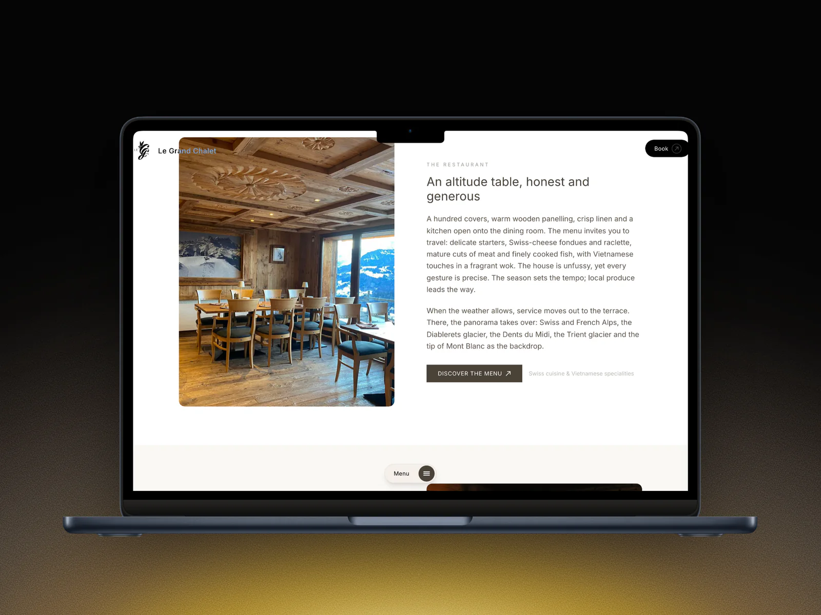 La page du restaurant du Grand Chalet en anglais sur un MacBook : An altitude table, honest and generous